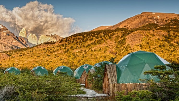 Six domes at the foot of a mountain at EcoCamp in Patagonia, Chile