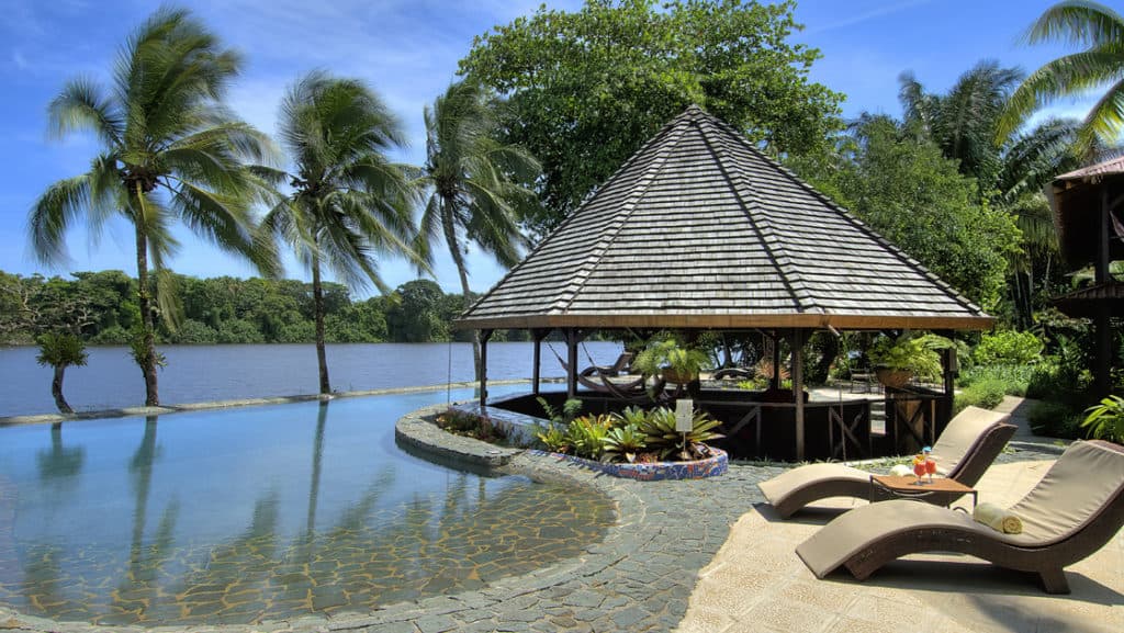 The pool at Tortuga Lodge, one of Costa Rica’s most environmentally conscious resorts, is designed to blend into the river and features an eco-friendly purification system.