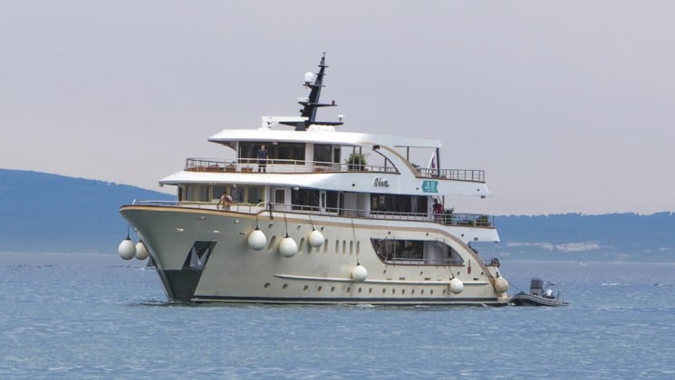 Riva luxury small ship cruising on the mediterranean around croatia on a sunny day