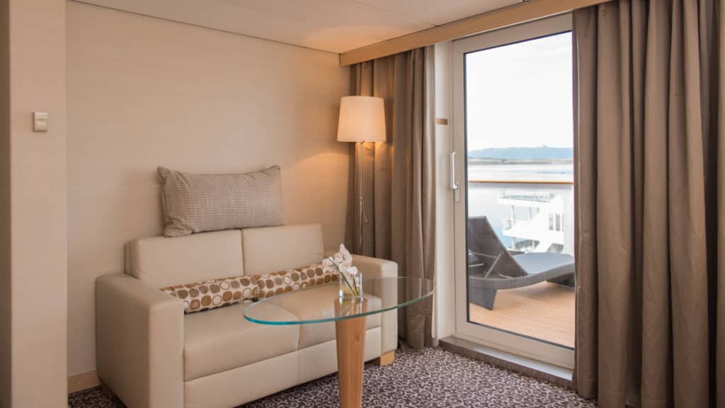 Balcony Suite sitting area aboard Ocean Diamond. Photo by: Rogelio Espinosa/Quark Expeditions