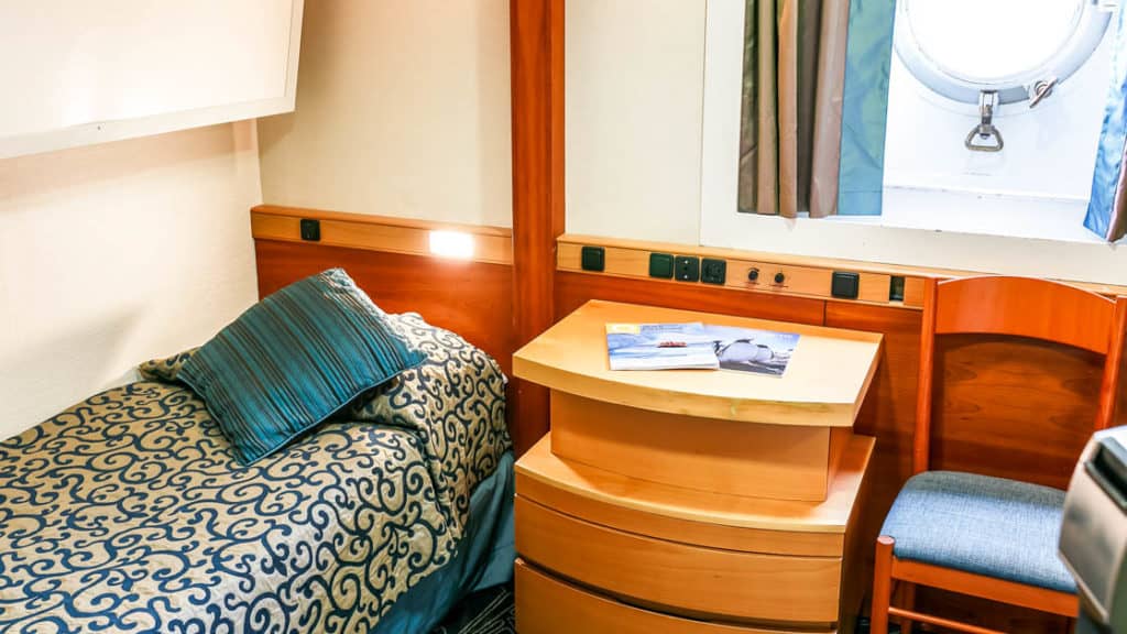Category 4A Single Porthole cabin aboard Ocean Endeavour. Photo by: JP Mullowney/Quark Expeditions