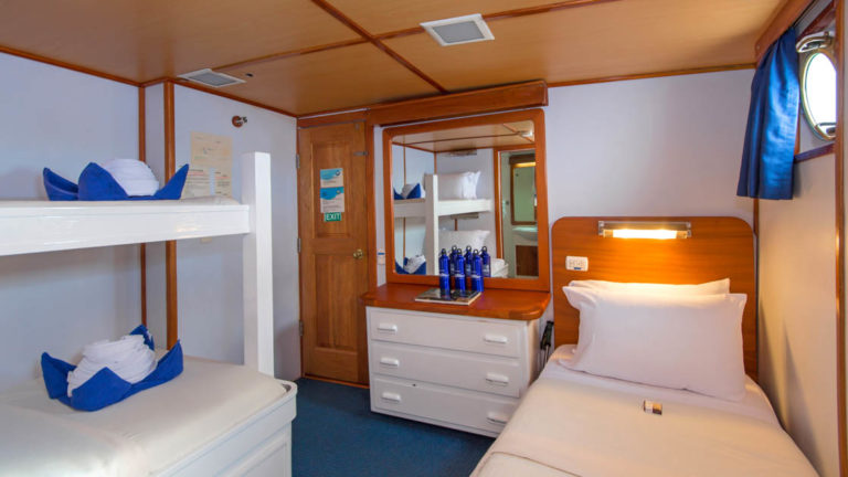 Cabin 1 triple aboard Beluga with bunk beds and twin bed.