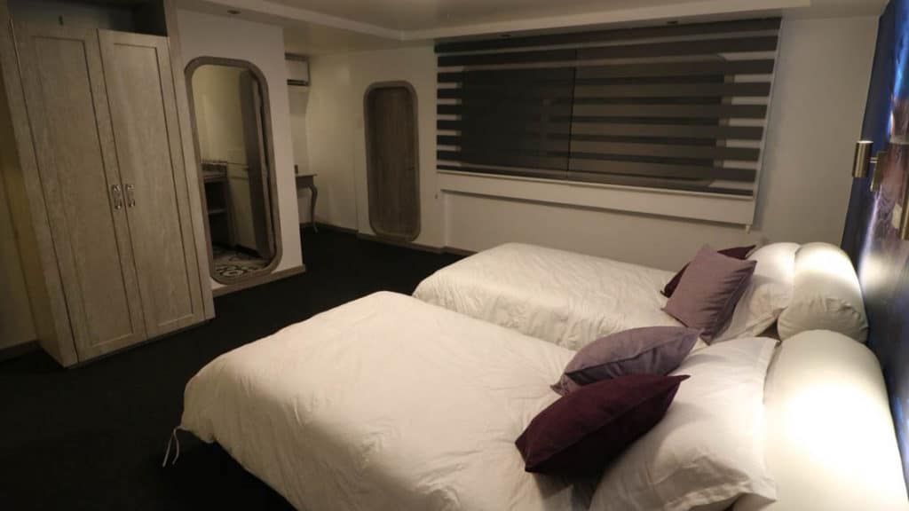 Stateroom with twin beds aboard Camila