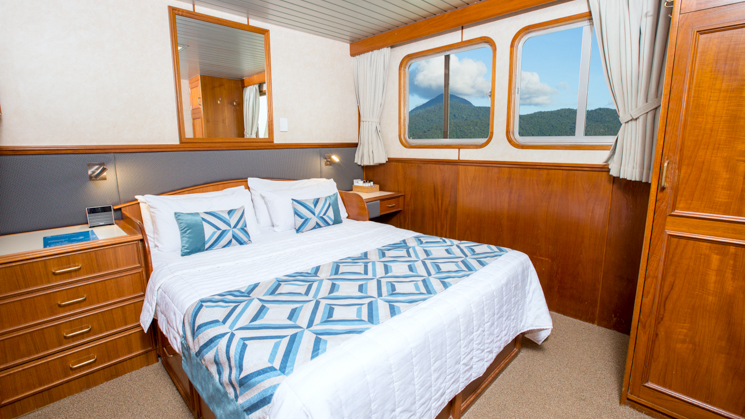Upper Deck Stateroom with double bed aboard Coral Expeditions II 