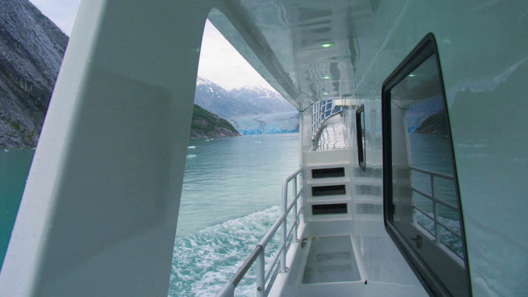 Misty Fjord aisle with steps going up to the bow of the ship as it sails into Tracy Arm glacier in Alaska.