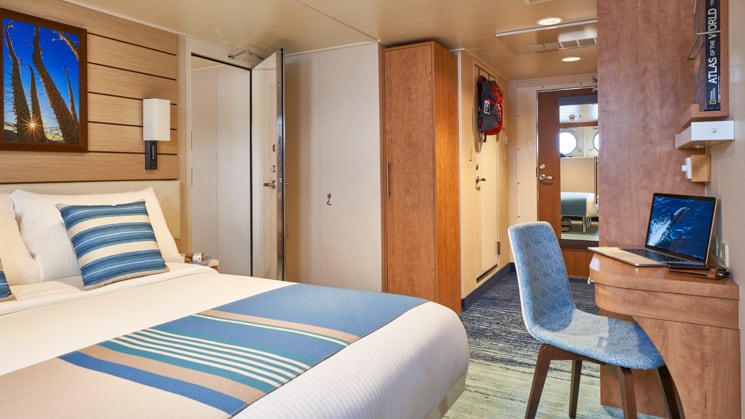 Category 2 cabin with queen bed aboard National Geographic Venture