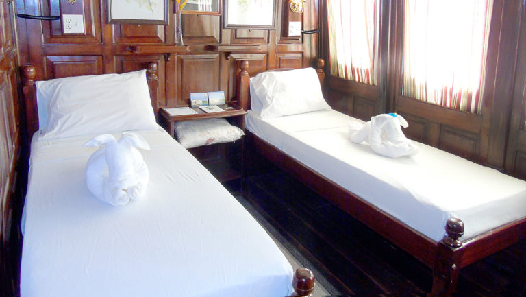 Yellow Category Cabin 4 with two single beds aboard Tucano.