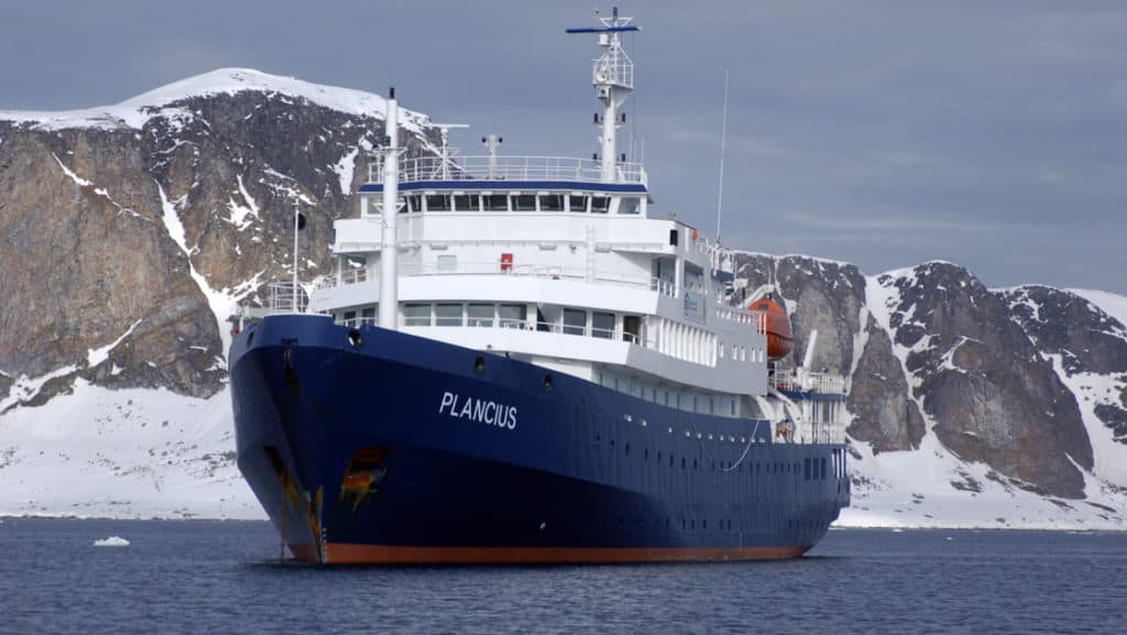 Plancius small ship cruising around Antarctica on a sunny day
