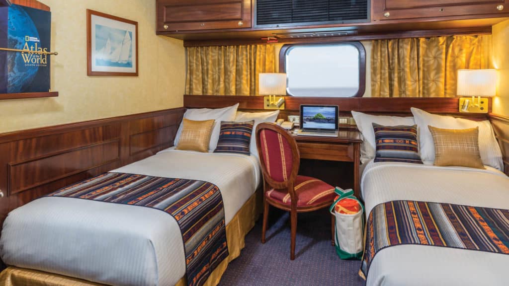 Category 2 cabin aboard National Geographic Islander. Photo by: Marco Ricca