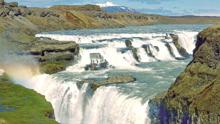waterfalls cascade over rocks in iceland