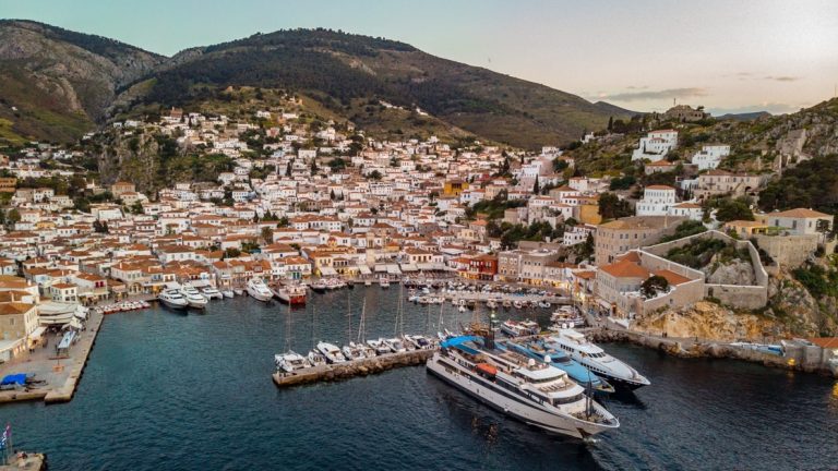Aerial view of mega yacht Variety Voyager docked in a small harbor during the Best of Greece & Turkey cruise.