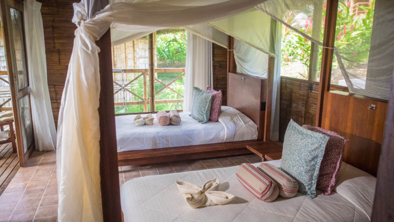 luxury amazon bungalow with two beds and canopy at la selva ecolodge