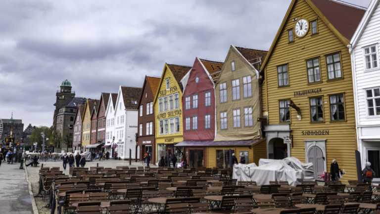 The UNESCO heritage site and colorful building fronts along the promenade by the water in downtown Bergen, Norway