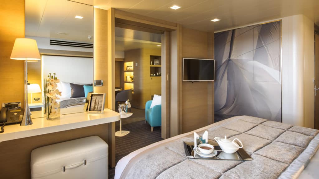 Owner's Suite with king bed aboard Le Soleal.  Photo by: Francois Lefebvre/Ponant