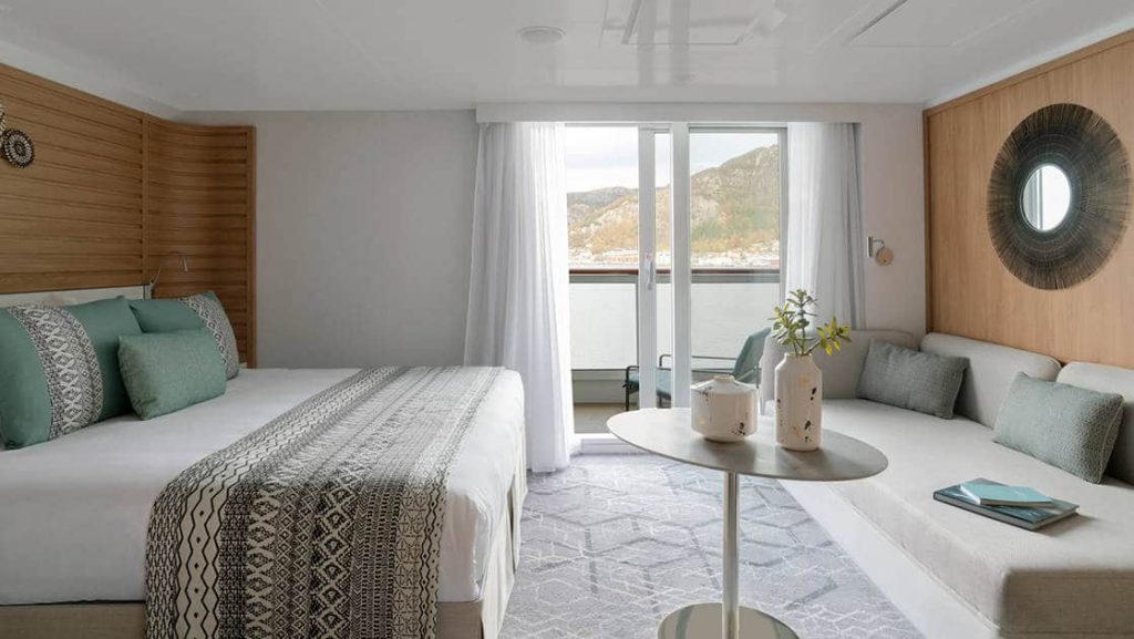 Deluxe Suite with king bed aboard Le Dumont D'Urville. Photo by: Francois Lefebvre/Ponant