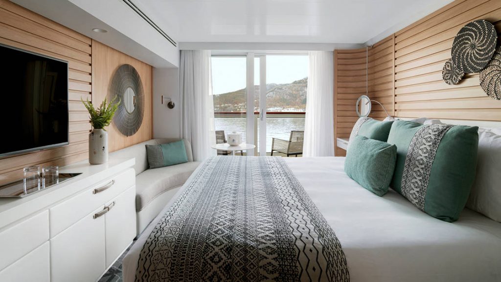 Prestige Stateroom - Decks 4, 5 & 6 with king bed aboard Le Jacques Cartier. Photo by: Francois Lefebvre/Ponant