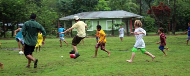Playing soccer with the local Tortugero kids and Costa Rican travelers.
